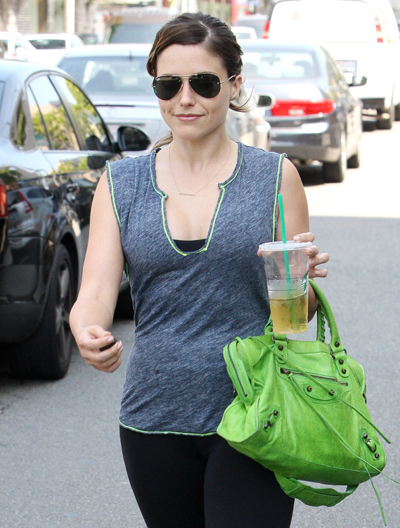 Sophia Bush toting a lime green Balenciaga bag while leaving the gym in  West Hollywood, California, on July 25, 2013