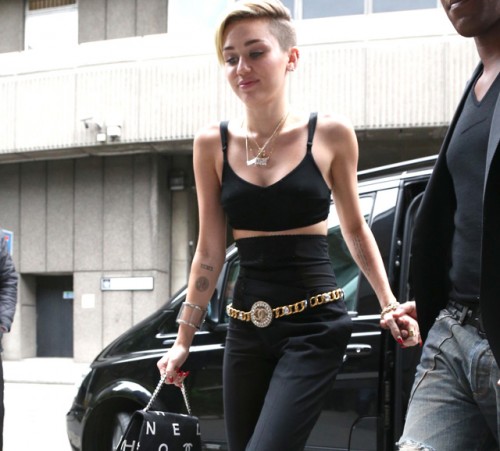 Miley Cyrus carries a Chanel bag in London (1)