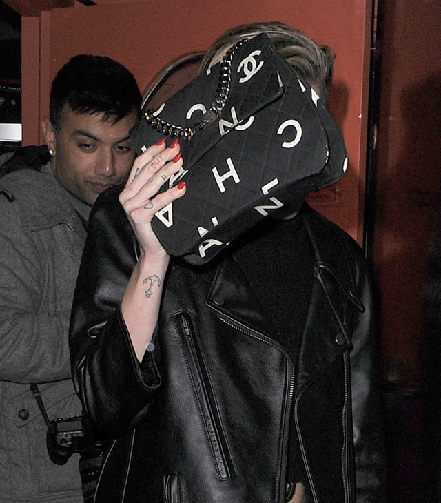 Miley Cyrus Carries the Infamous Chanel Graffiti Backpack - PurseBlog