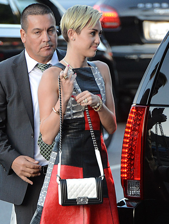 Miley Cyrus Is Just Bein' Miley With Her Chanel Backpack - PurseBlog