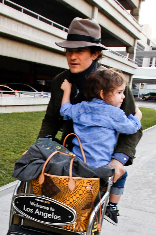 Orlando Bloom opts for a £855 Louis Vuitton harness at glitzy