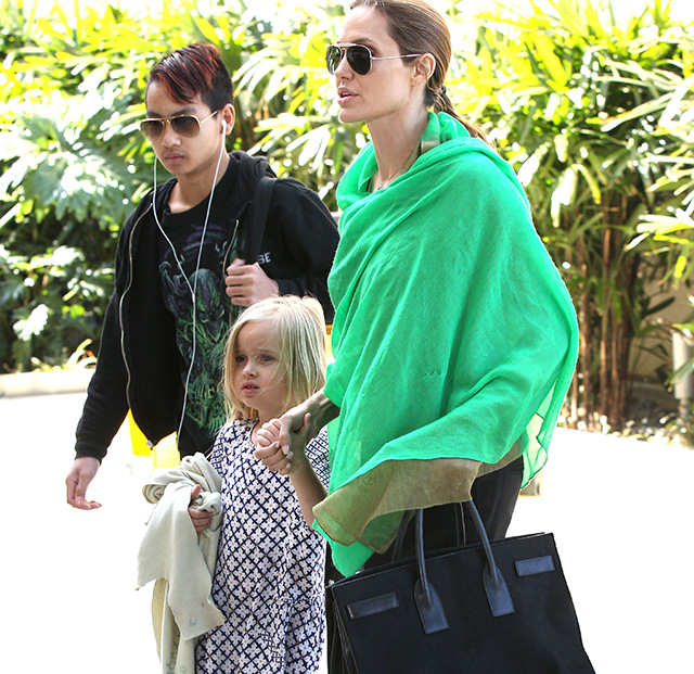 Angelina Jolie Travels with Saint Laurent - PurseBlog