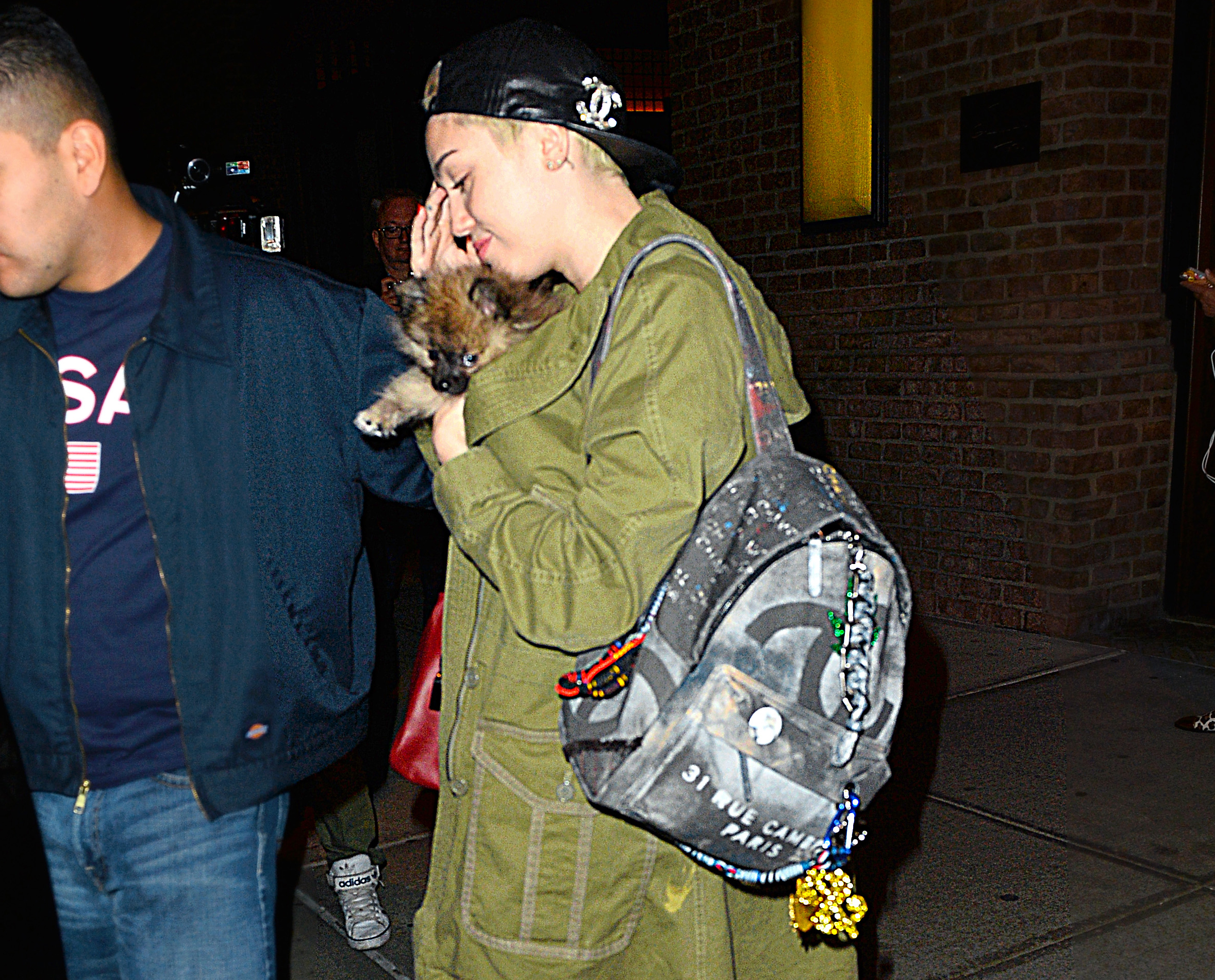 Miley Cyrus Carries The Infamous Chanel Graffiti Backpack Page 5 Purseblog