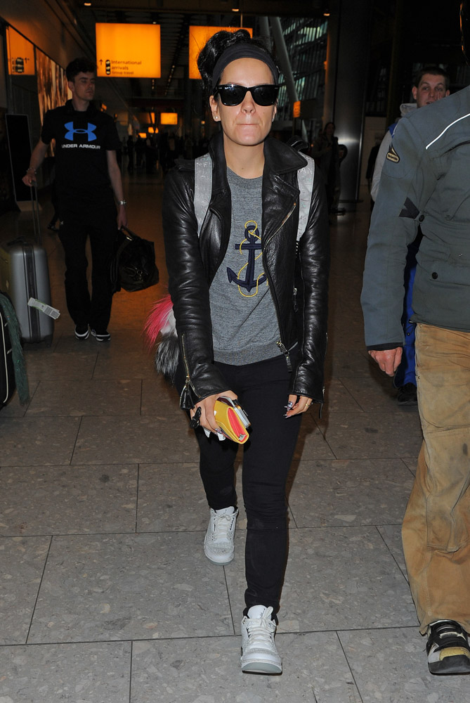 Lily Allen Returns to London with Chanel's Graffiti Backpack