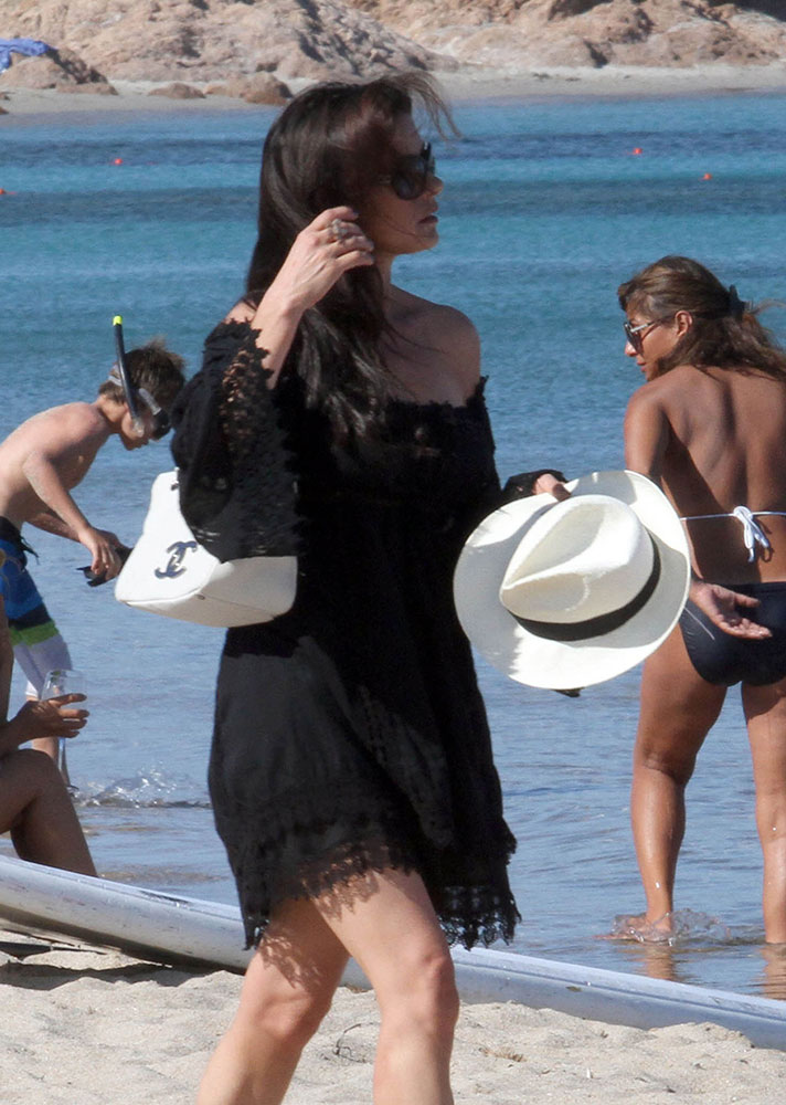 Adriana Lima Takes Her Louis Vuitton Bag to the Beach - PurseBlog
