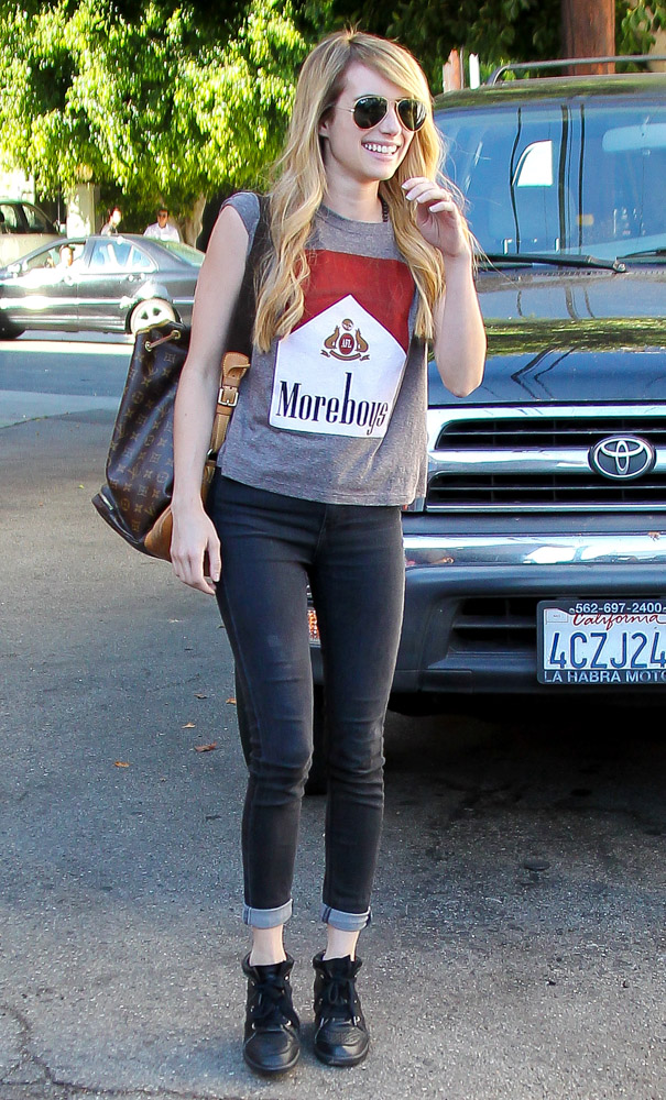 Emma Roberts Carries a Vintage Louis Vuitton Backpack - PurseBlog