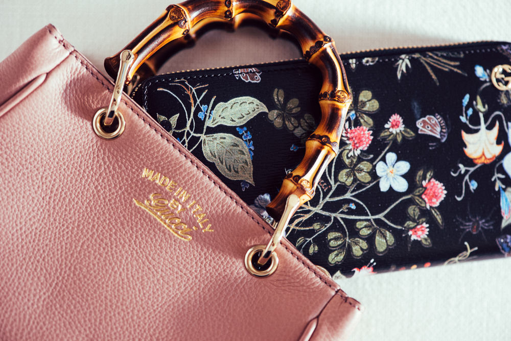 Gucci Bamboo Shopper Mini Top Handle. $1,350 via Gucci. Gucci Flora Knight Print Zip Around Wallet. $545 via Gucci.