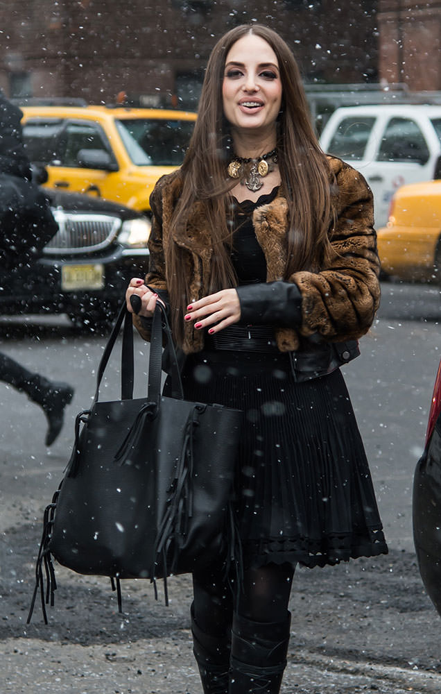 Rosario Dawson Looks Totally Casual with a Coach Mini Bag - PurseBlog