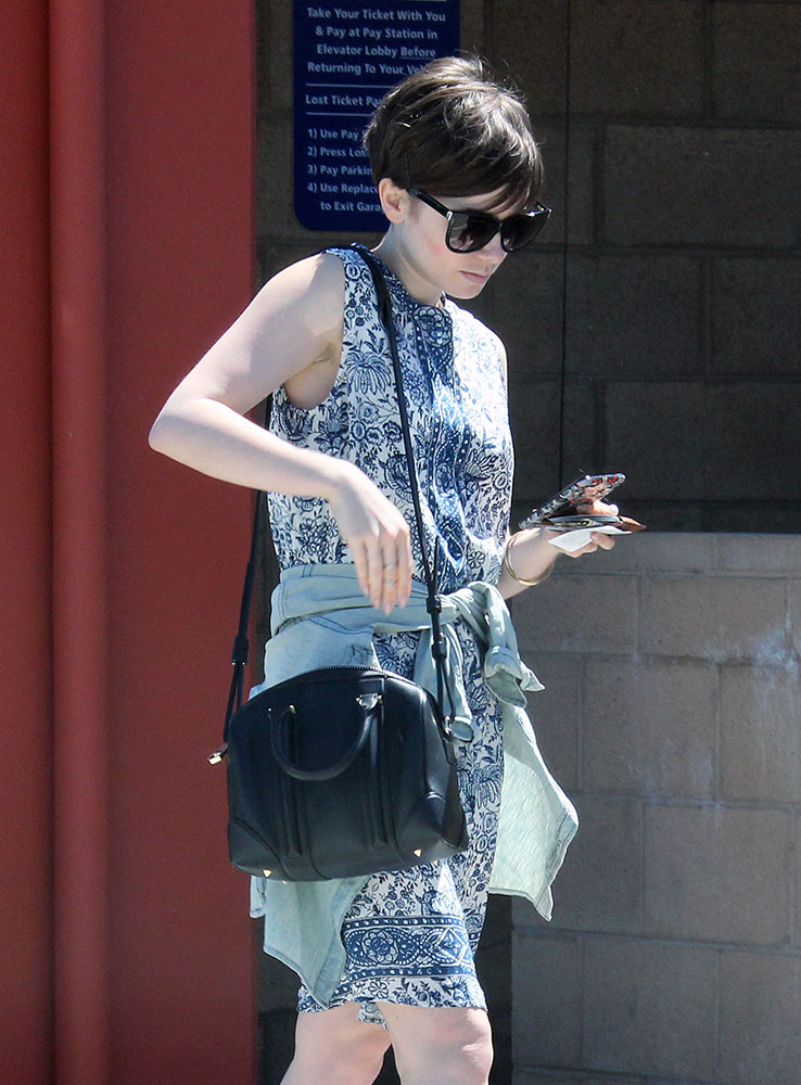 Lily Collins Arrives at LAX with a New Prada Bag - PurseBlog