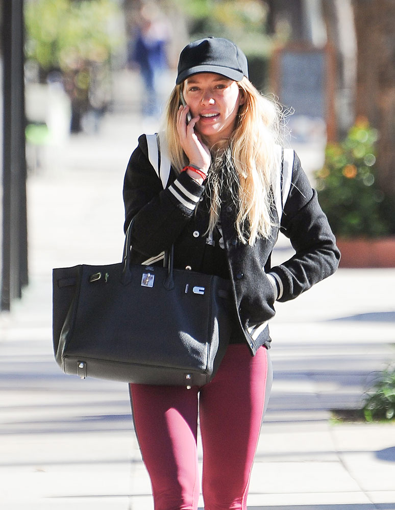 Hilary Duff Doubles Up with Bags from Louis Vuitton and Goyard - PurseBlog