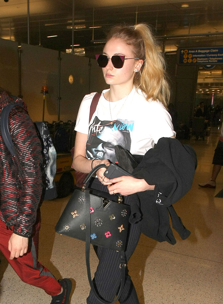 Celebs Flock Through LAX and Rep Their Teams with Bags from Louis Vuitton,  Dior and Alaïa - PurseBlog
