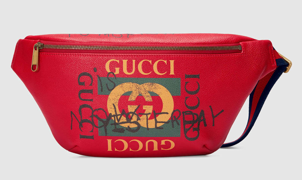 red gucci fanny pack with writing