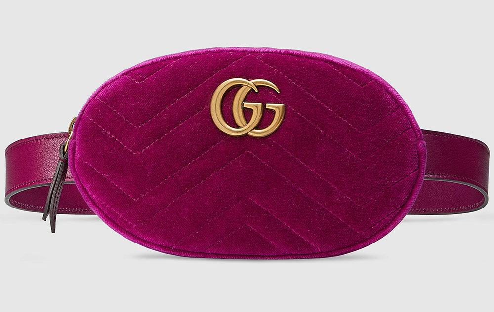 gucci fanny pack with writing on it