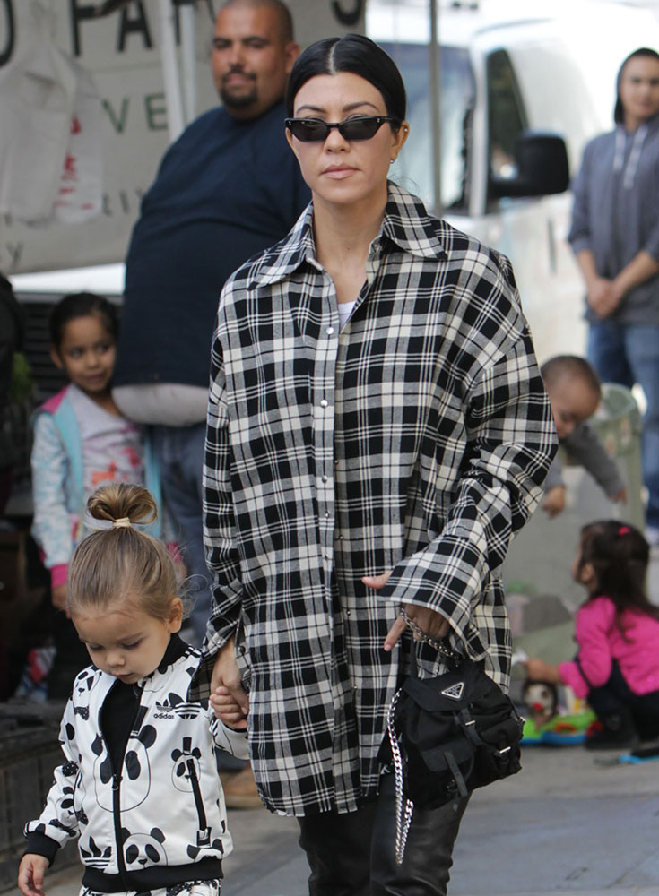 Just Can't Get Enough: Kourtney Kardashian Loves Her Mini Backpacks -  PurseBlog