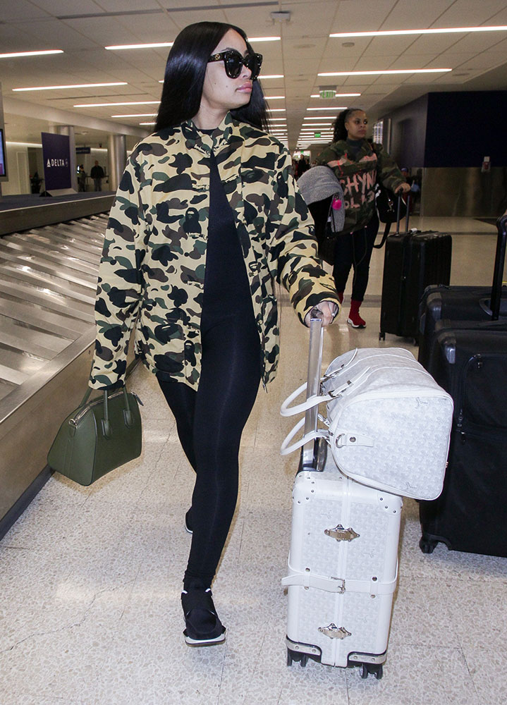 This Week, Celebs Addressed Their Travel Needs with a Variety of Bags from  MCM, Goyard and Saint Laurent - PurseBlog