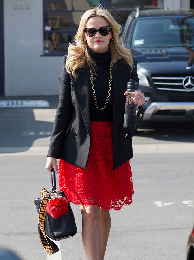 Reese Witherspoon sports a cheery red Louis Vuitton bag - PurseBlog