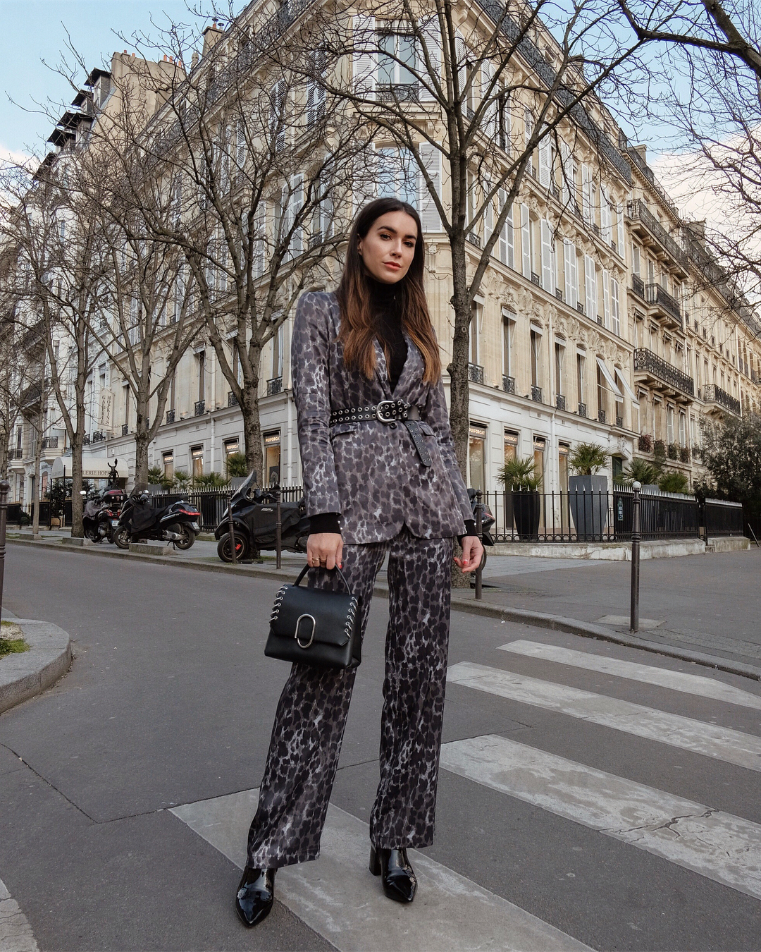 Brittany Xavier wearing Louis Vuitton outside Louis Vuitton Paris