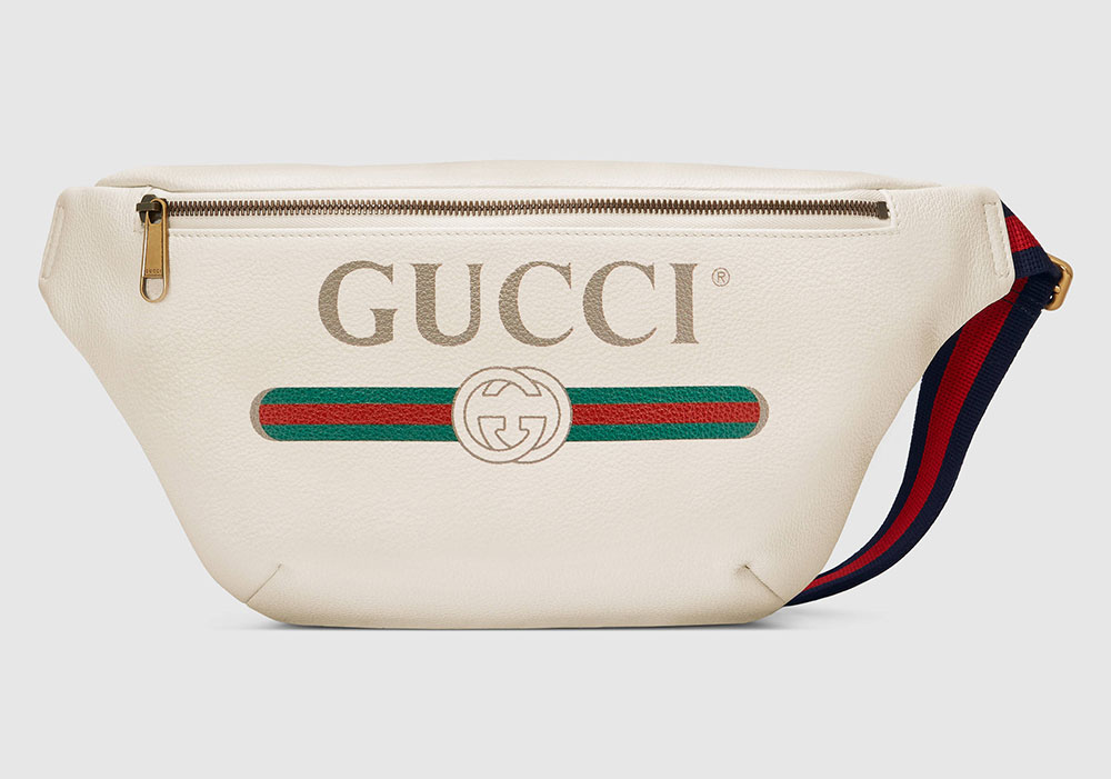 gucci fanny pack with writing on it