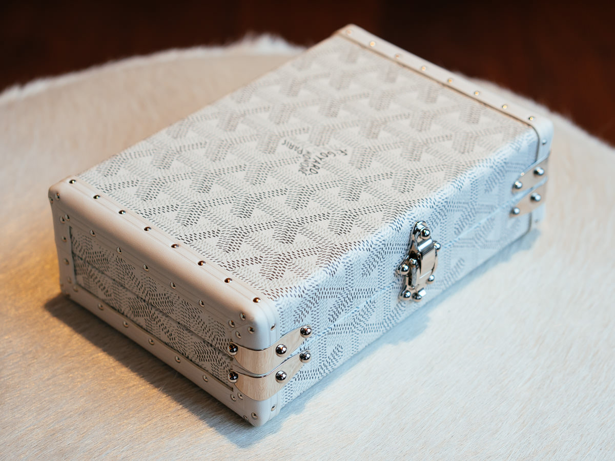 goyard trunk clutch