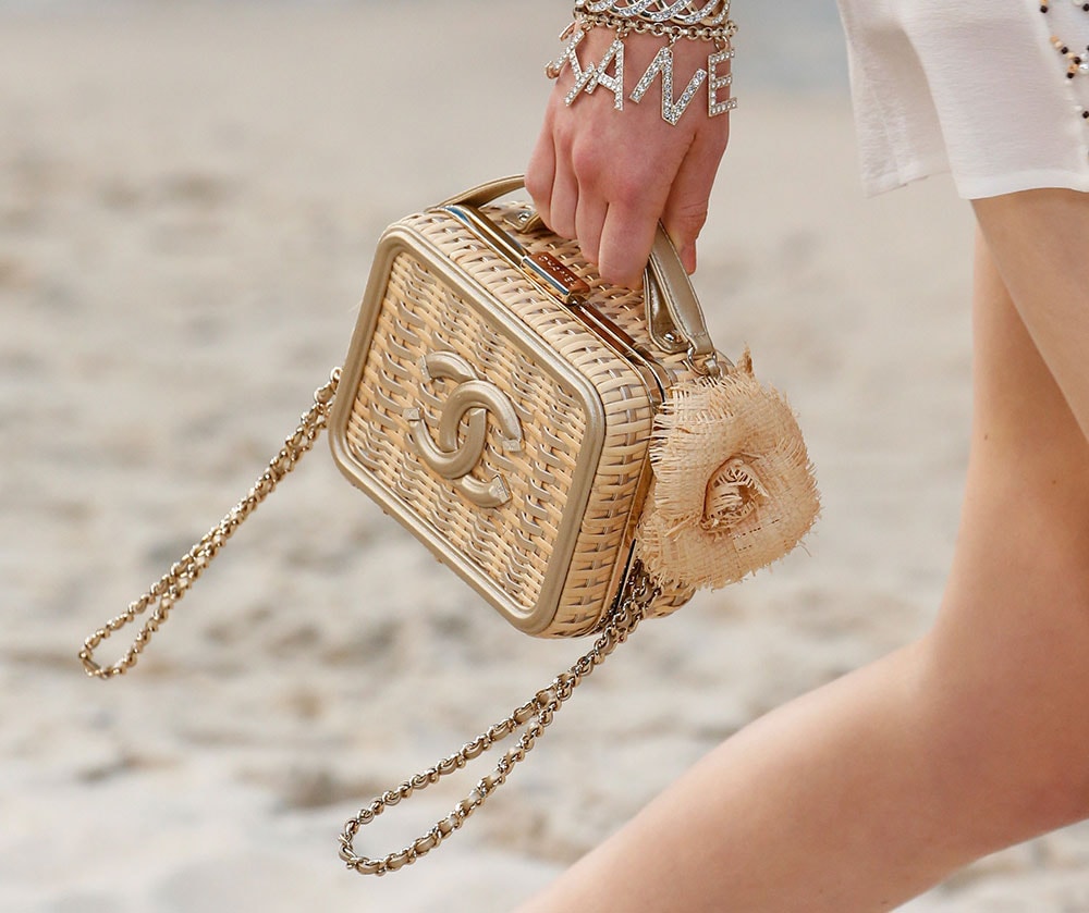 Chanel Took Its Spring 2019 Collection to the Beach, Including Terrycloth  Flap Bags and Beach Ball Clutches - PurseBlog