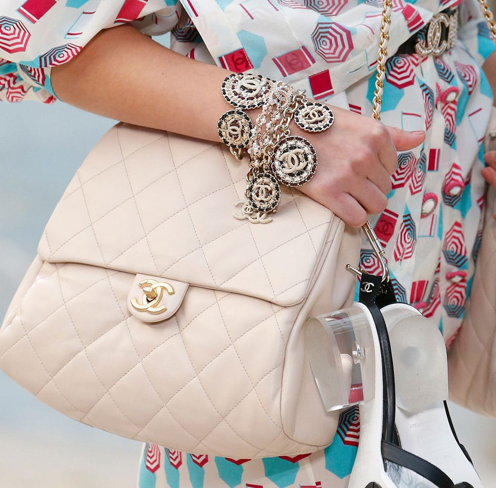 Chanel Took Its Spring 2019 Collection to the Beach, Including Terrycloth Flap Bags and Beach ...