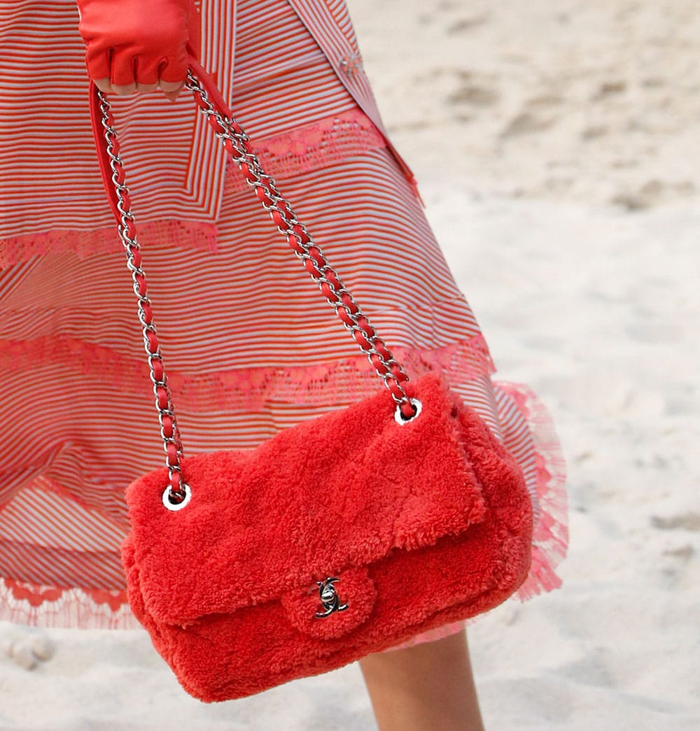 Chanel Took Its Spring 2019 Collection to the Beach, Including Terrycloth  Flap Bags and Beach Ball Clutches - PurseBlog