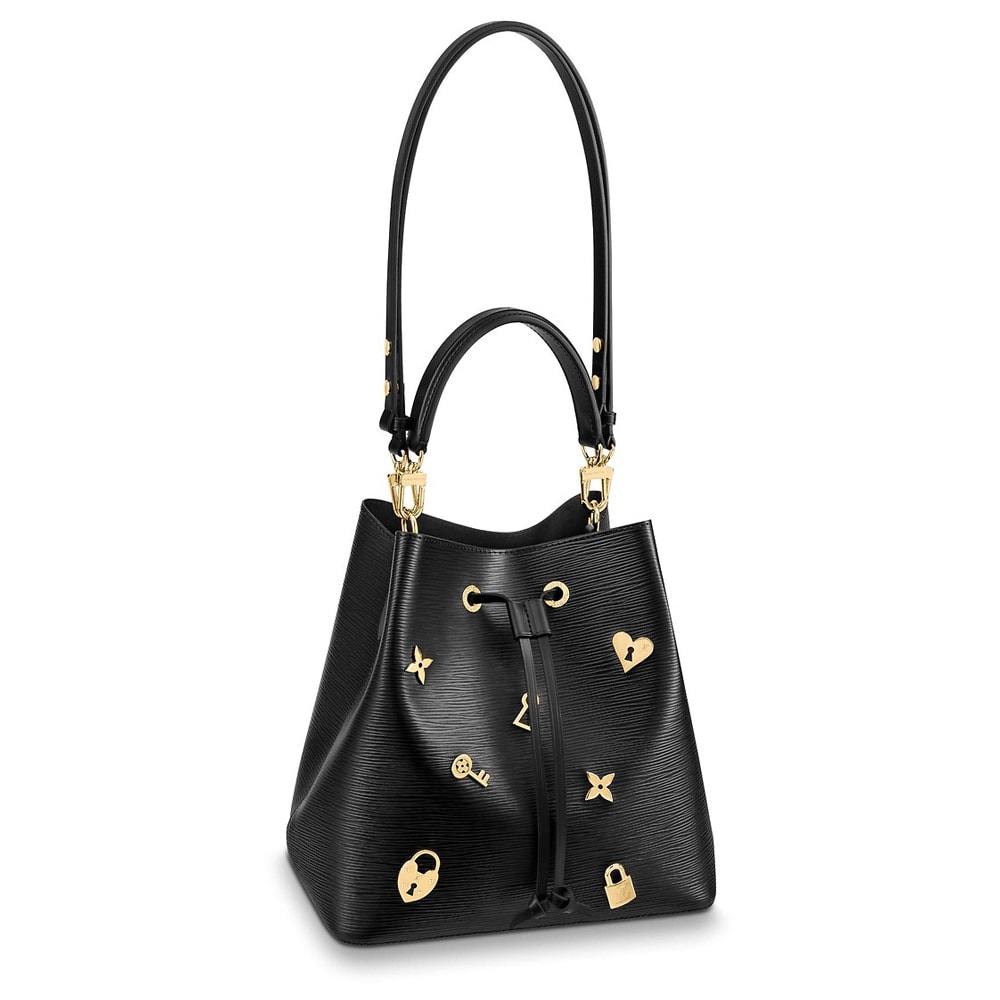 Louis Vuitton, Love note. Crafted in black leather with gold-toned LV  turn-lock closure and chain link. Turn lock closure opens to a black suede  interior with s…