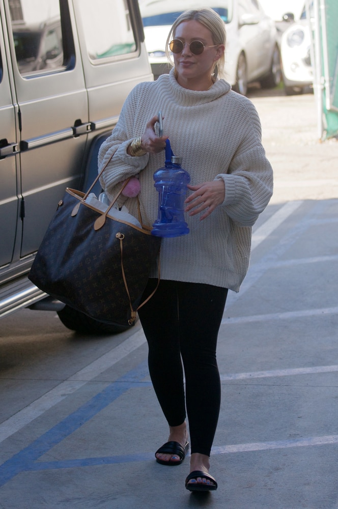 Hilary Duff Doubles Up with Bags from Louis Vuitton and Goyard