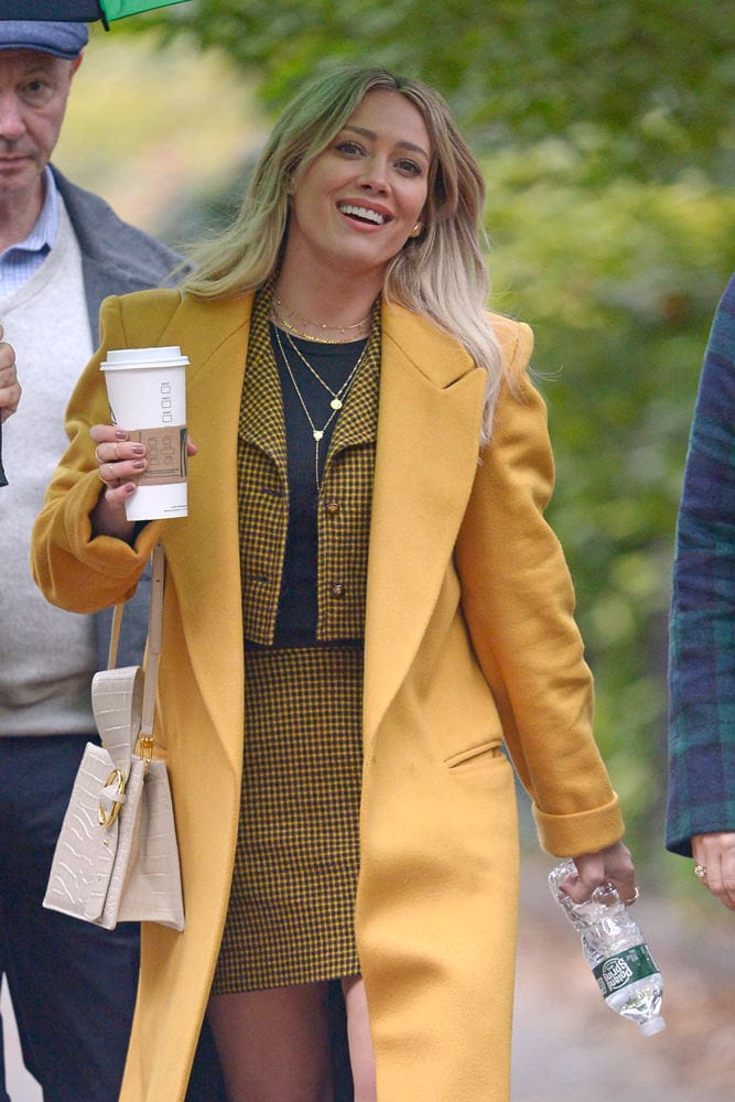 Celebs Endure Blustery Days with Versace, Goyard and FRAME - PurseBlog