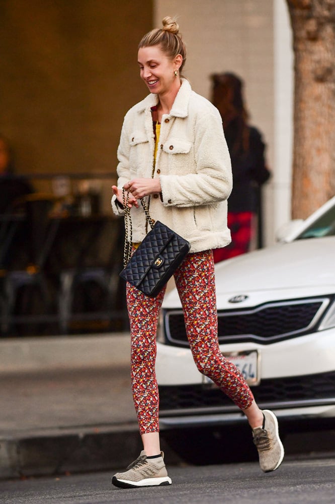 Bella Hadid carries her Louis Vuitton and Chanel bags as she steps