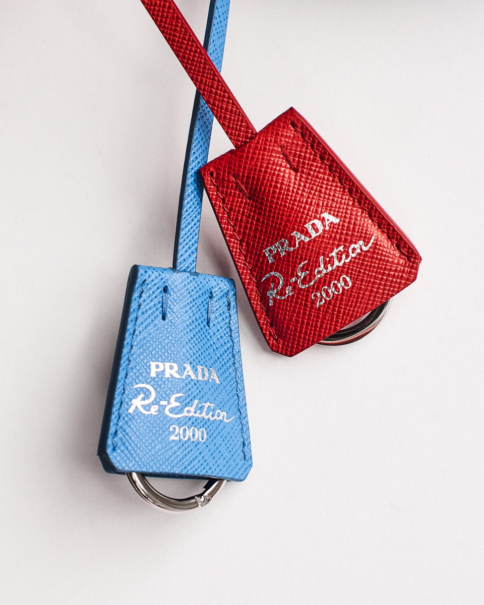 Shop PRADA RE NYLON Re-Nylon and Saffiano leather mini pouch (2ZT022,  2ZT022-2DMH-F0002) by ThePeninsula