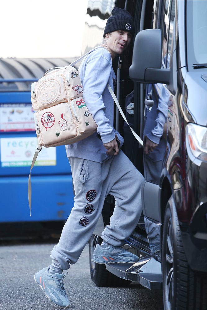 Justin Bieber wearing Louis Vuitton Backpack