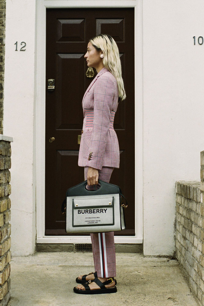 Black and cream belt from aus Burberry featuring a logo-embossed metal buckle in silver-tone