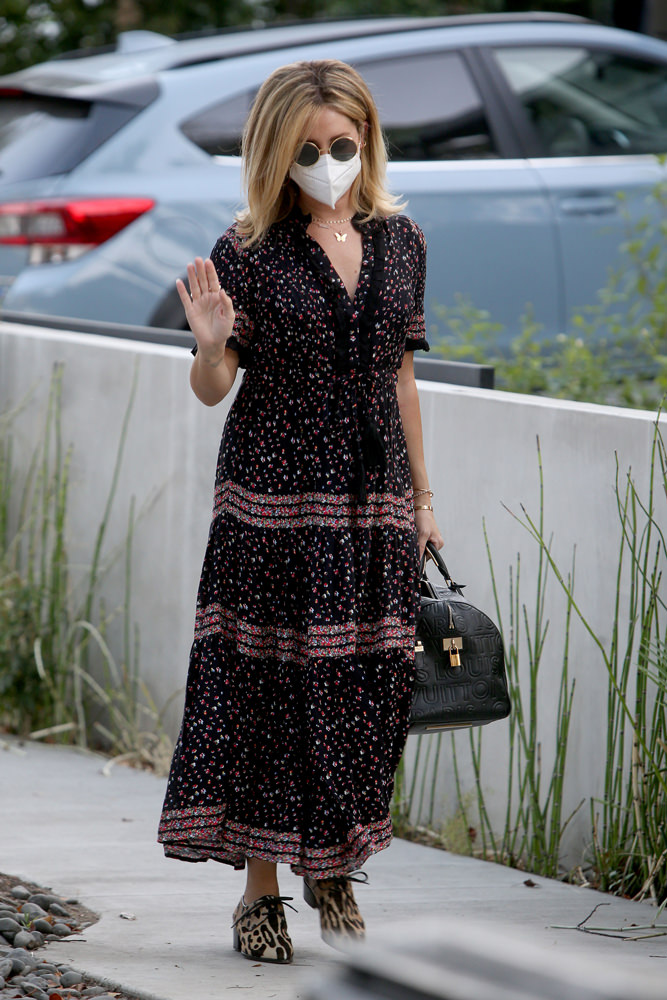 Celebs Accessorize With Masks and Carries from Balenciaga and