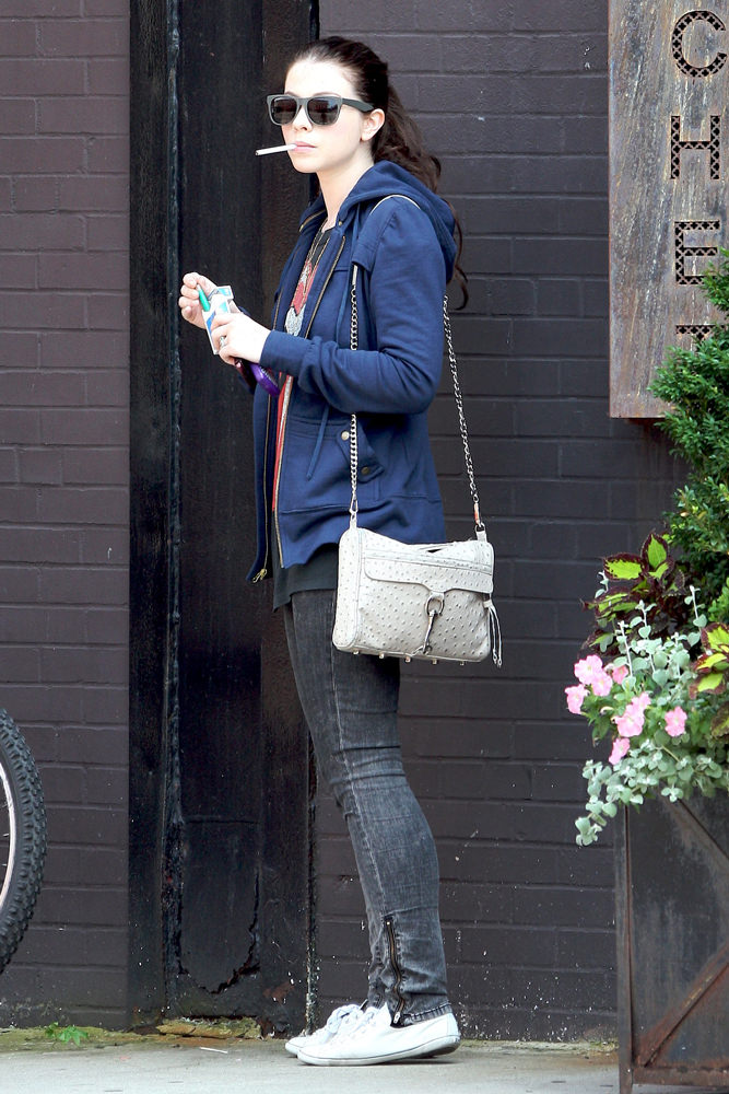 Celebs Pair Black Bags With Denim As Spring Forges On - PurseBlog