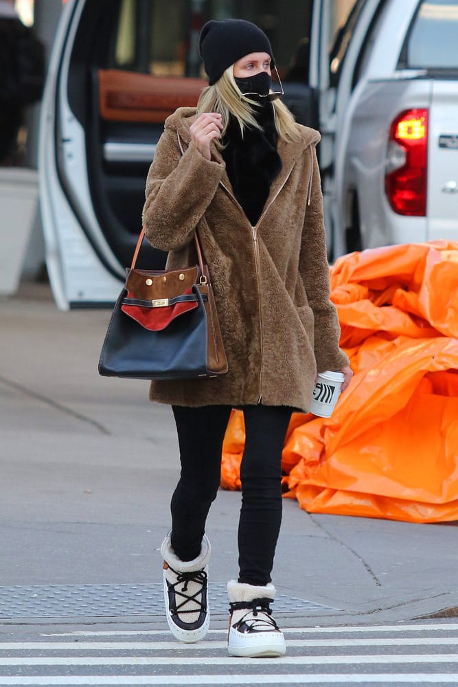 Celebs Flit About Town With Bags From Saint Laurent, Chanel and More -  PurseBlog