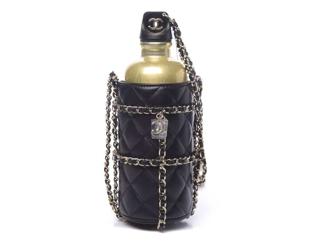 METCHA  CHANEL'S leather wrapped water-bottle holder