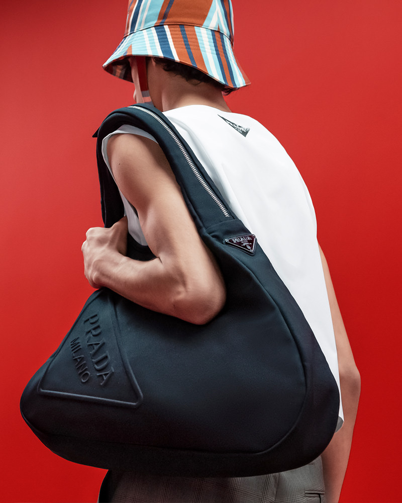 Prada Reimagines Its Iconic Triangle Logo as a Duffel for Men's