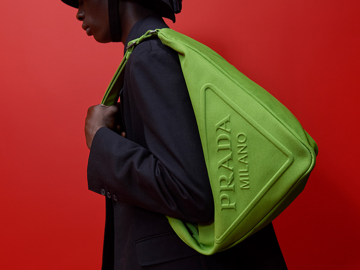 Prada Reimagines Its Iconic Triangle Logo as a Duffel for Men's Spring 2022  - PurseBlog