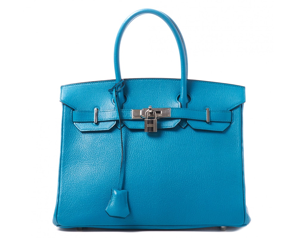 Designer handbag with lock and key deals