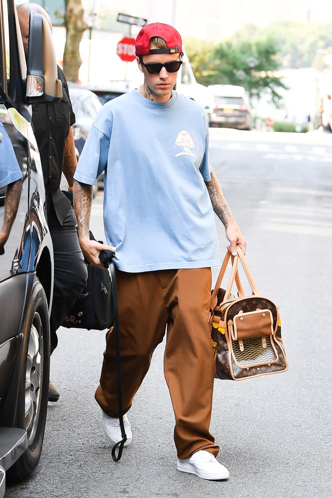 Justin Bieber wearing Louis Vuitton Backpack