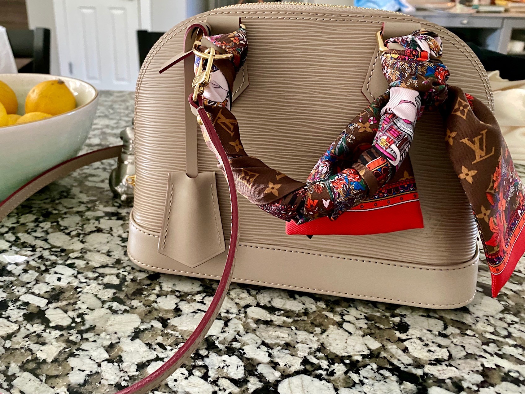 Introducing the Louis Vuitton Neo Alma in Monogram Empreinte - PurseBlog