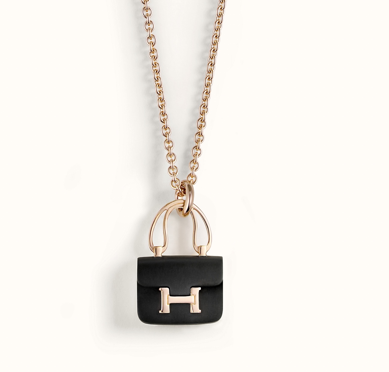 Constance Amulette Pendant in Rose Gold and Black Jade. Photo via Hermes.com