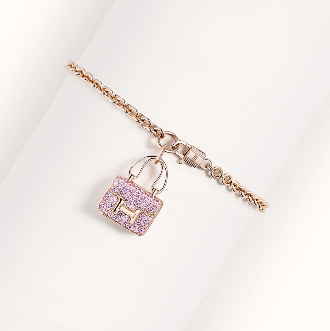 Constance Amulette Bracelet in rose gold with pink sapphires. And look at the adorable little Cadena clasp!! Photo via Hermes.com