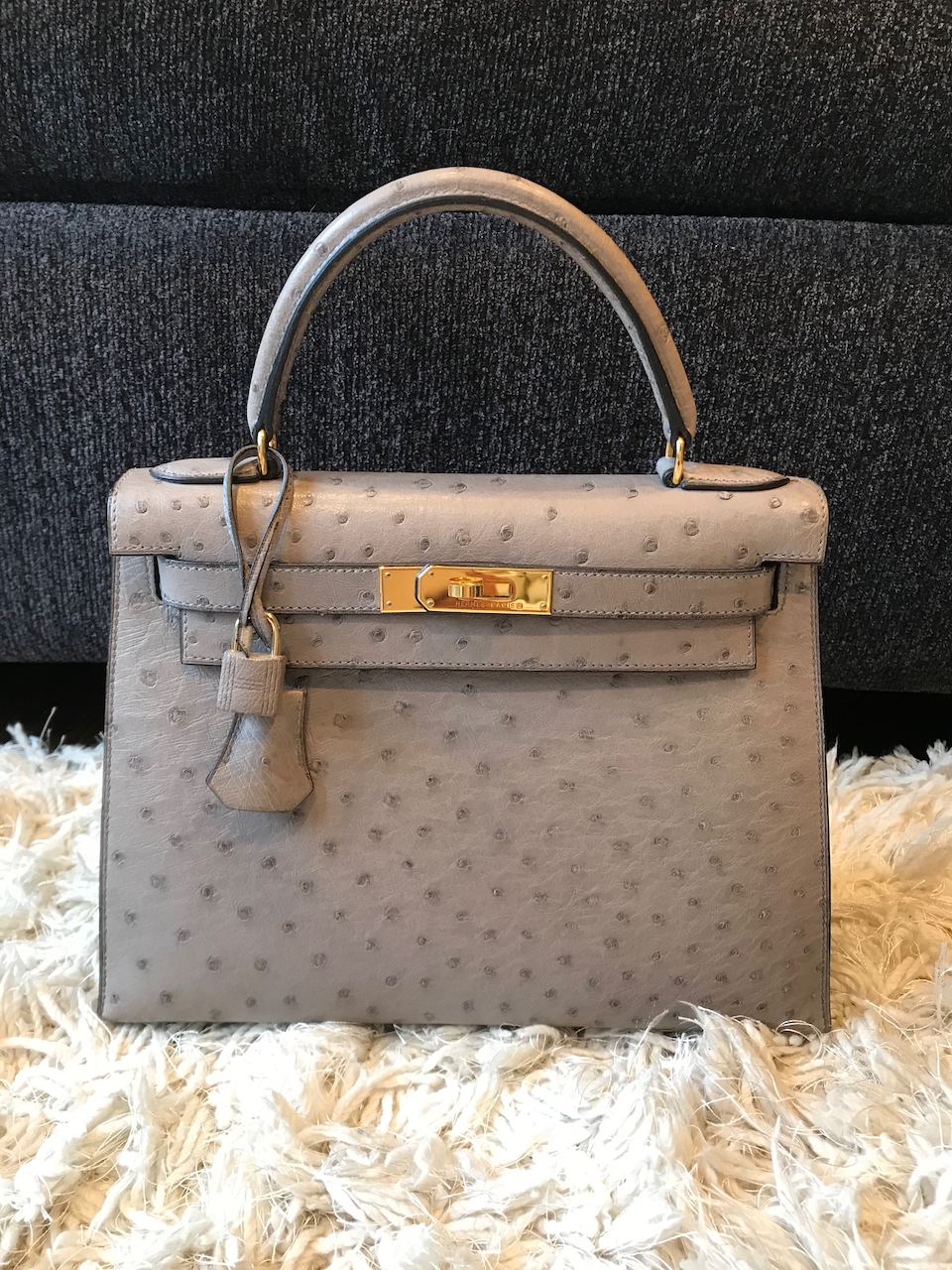 28cm Kelly Sellier in Ostrich. If well-cared for, Ostrich will last a very long time - this bag is from 1999! Photo via @The_Notorious_Pink