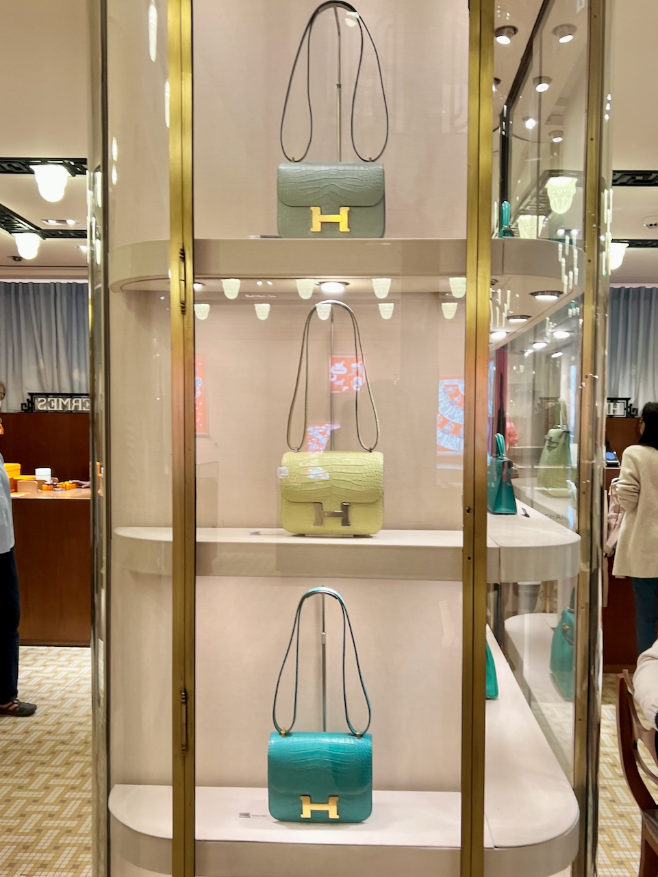 A triumvirate of exotic Constance bags on display at Hermès Faubourg. Photo via @The_Notorious_Pink