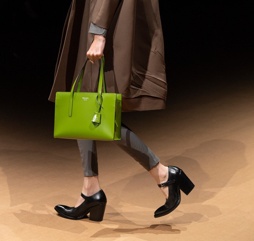 Prada Emblème brushed-leather Bag - Farfetch in 2023