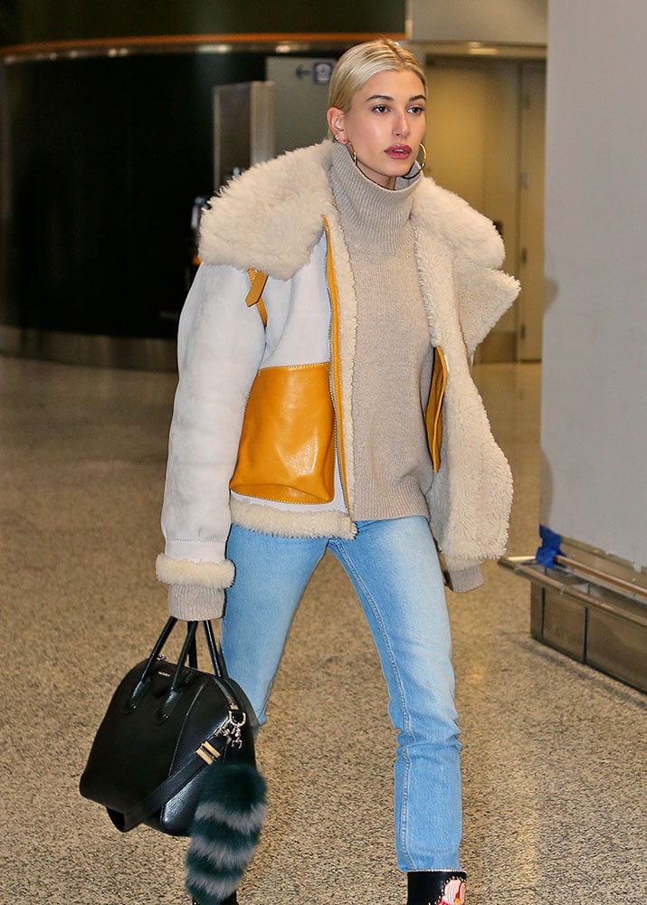 Hailey Bieber Matches $1,800 Louis Vuitton Bag With Satin Pajamas