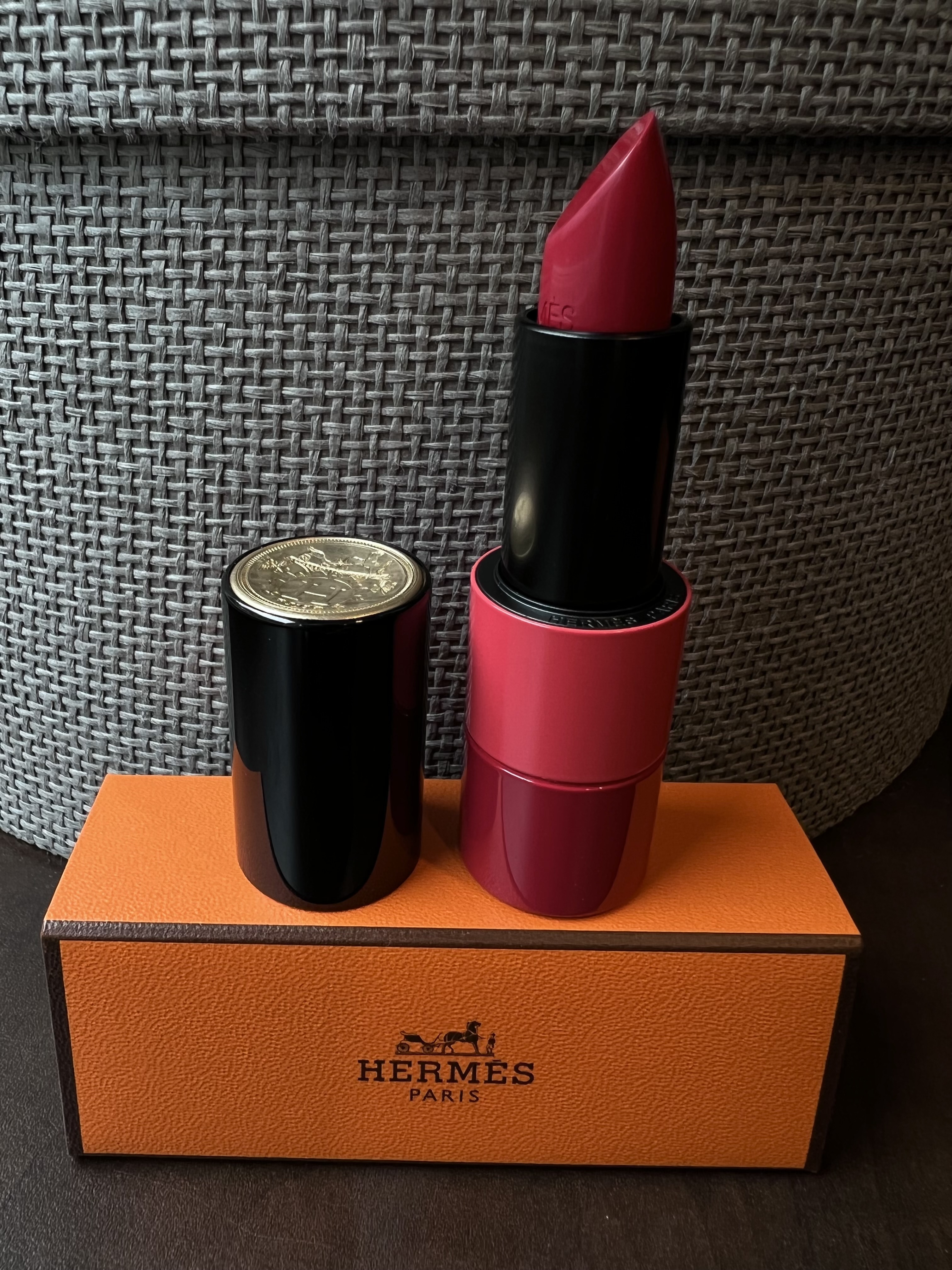 Satin Lipstick in the color Rouge Grenade. Photo via @The_Notorious_Pink.