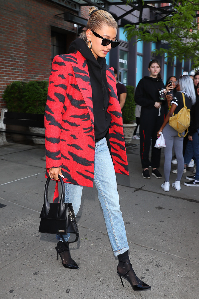 Hailey Bieber Matches $1,800 Louis Vuitton Bag With Satin Pajamas